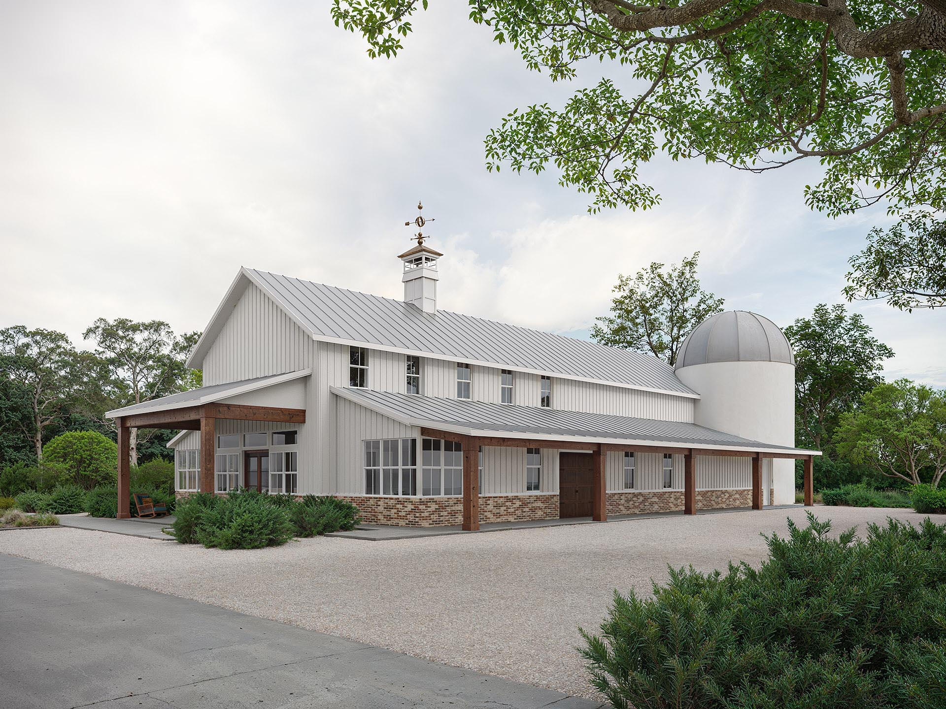 Photorealistic rendering of a modern farmhouse with a metal roof, white siding, and a prominent silo – architectural visualization.