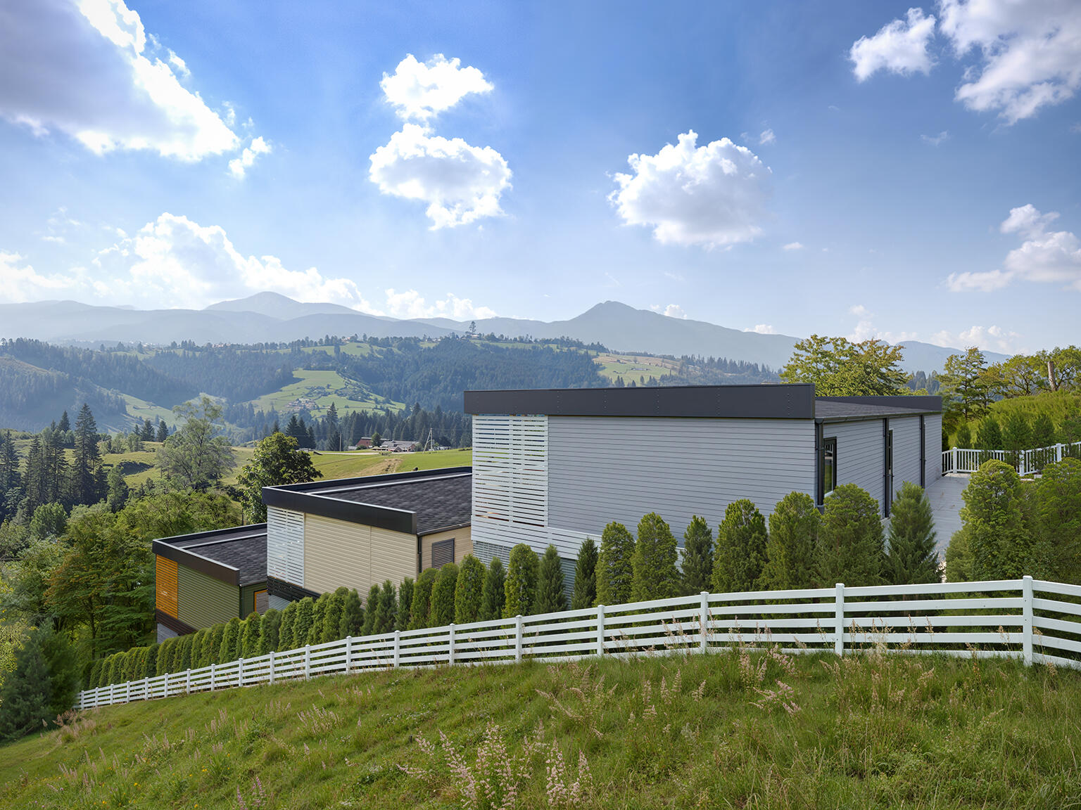 Mountain House Landscape Visualization High quality 3D render of a modern house nestled in a mountain landscape, highlighting the scenic views and green surroundings