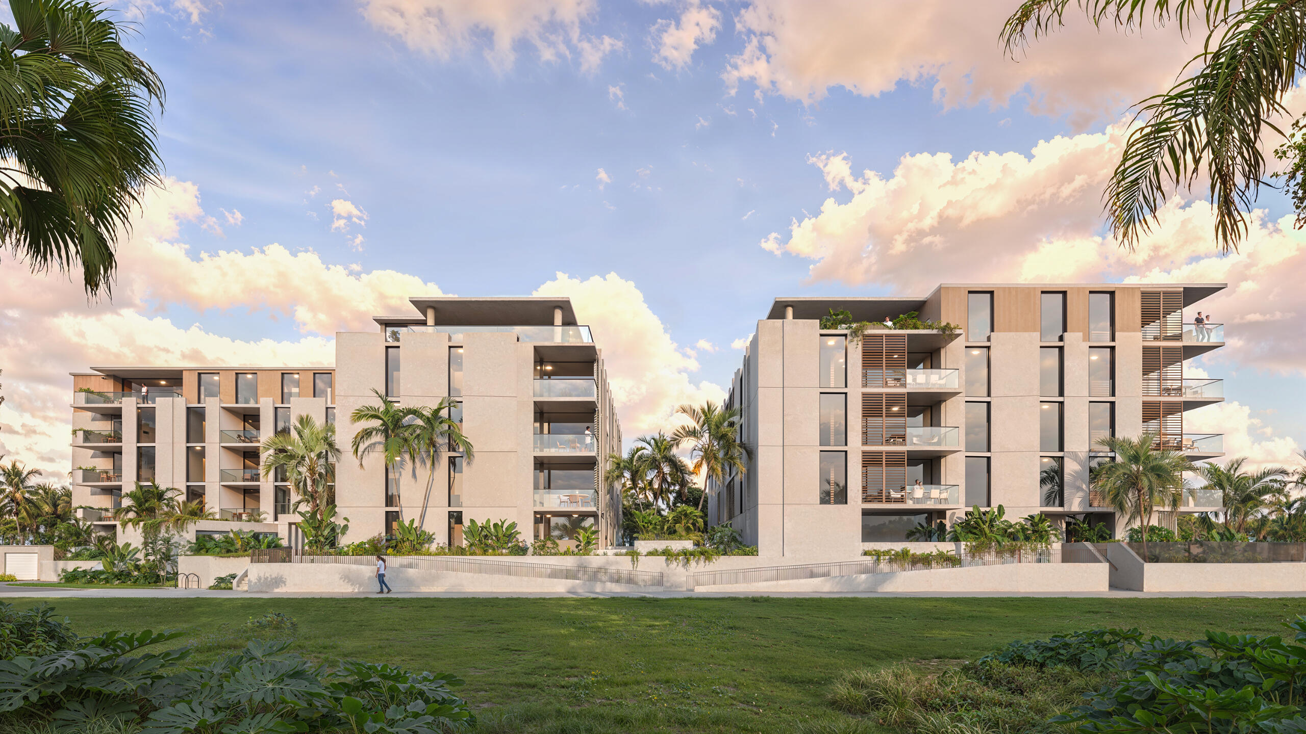 tropical-apartment-complex-visualization Tropical apartment complex with palm trees and sunset sky – 3D visualization High End