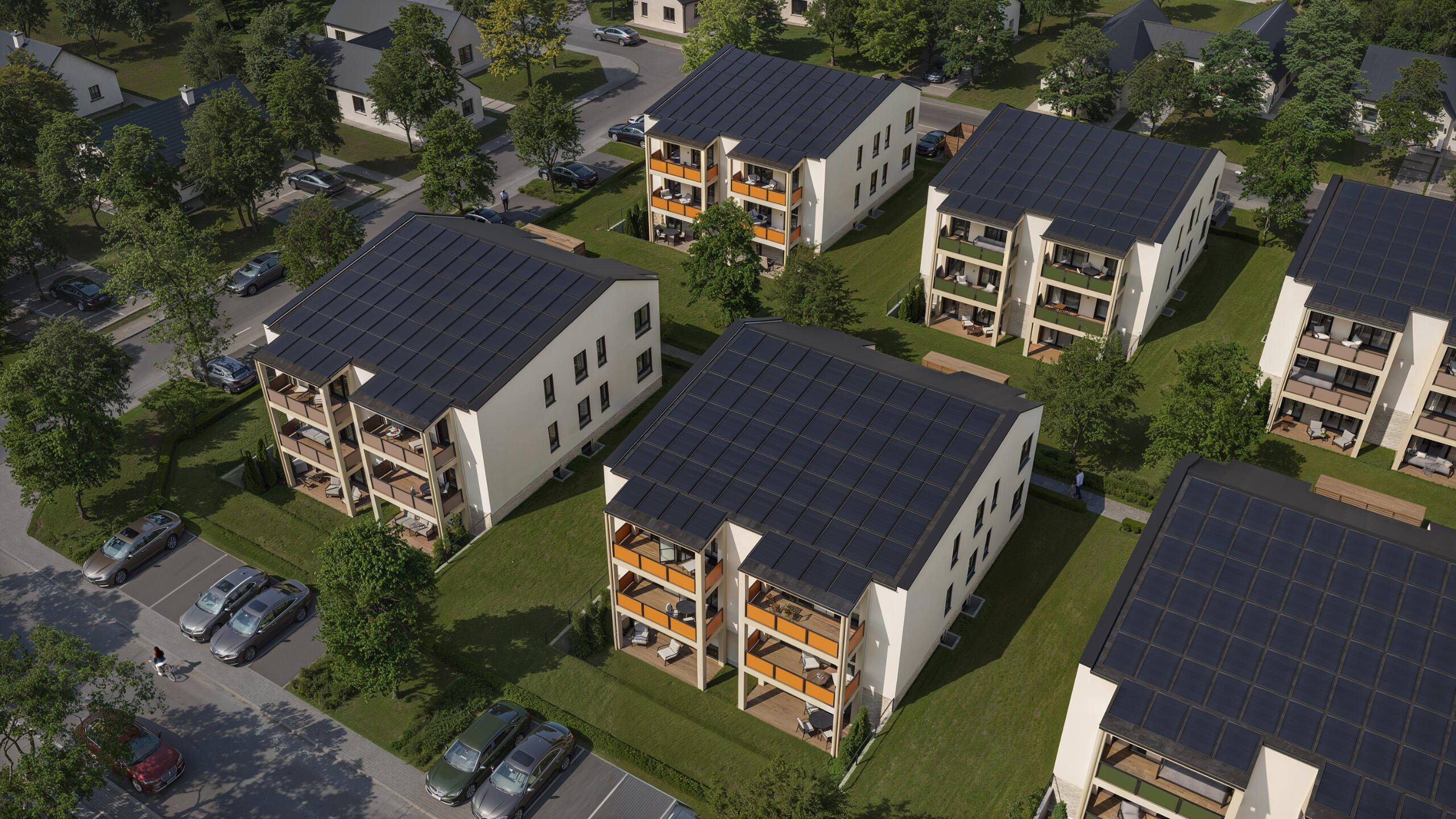 modern-residential-blocks-aerial-render Aerial render of modern residential apartment blocks with balconies and greenery